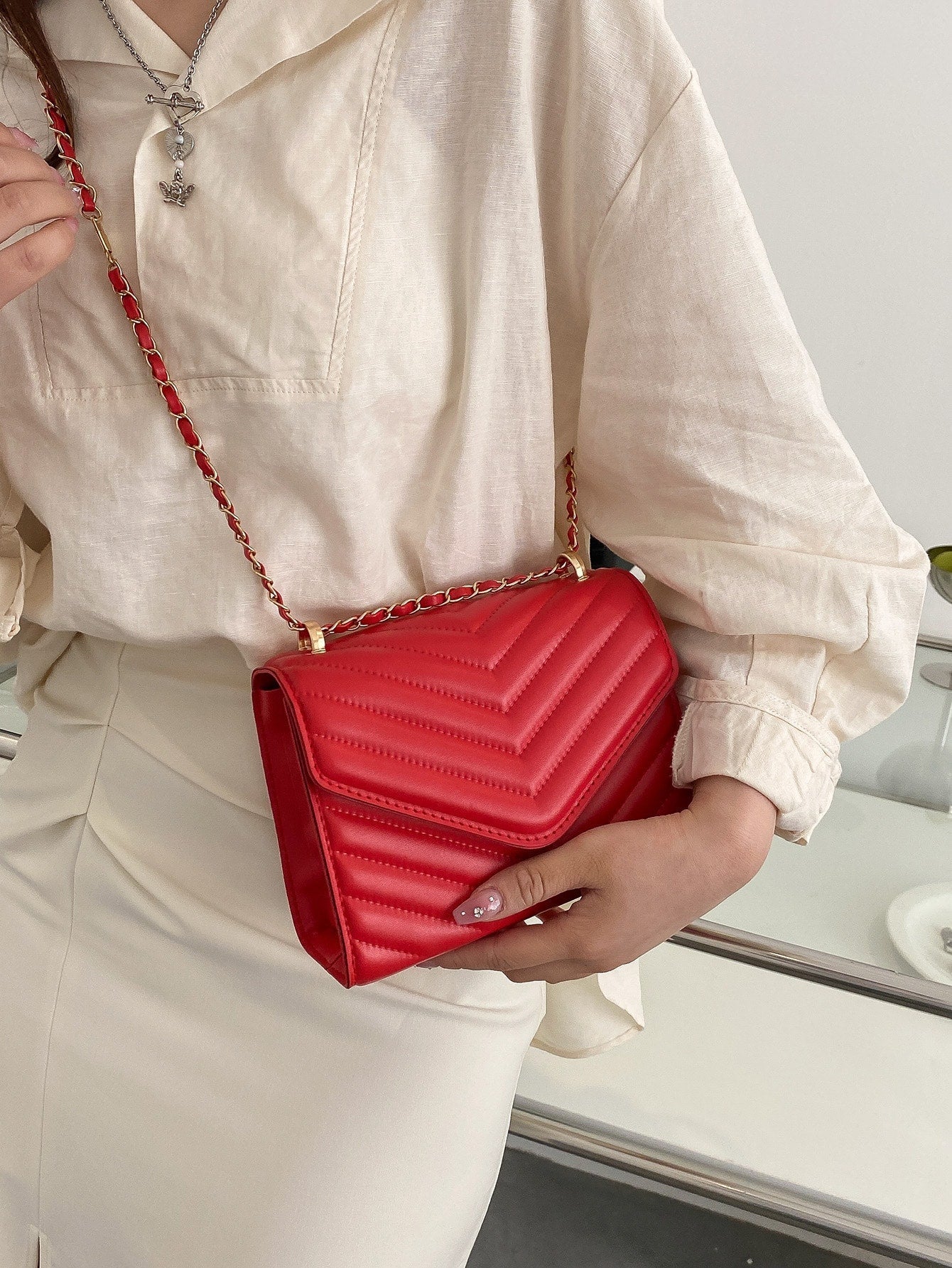 Quadratische Tasche mit Chevron Druckknopf